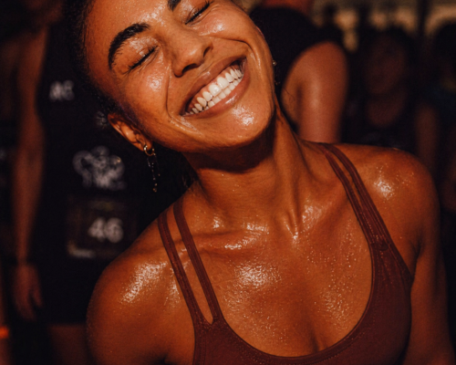 Generated with Kive.ai - reproduce this with she is sweating a lot and has a bright smile